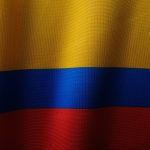a close up of a red, yellow and blue flag